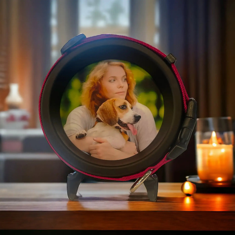 Beagle pet tribute frame with pink collar, shown beside a lit remembrance candle on a wooden table. - Perfect Pet Loss Gift