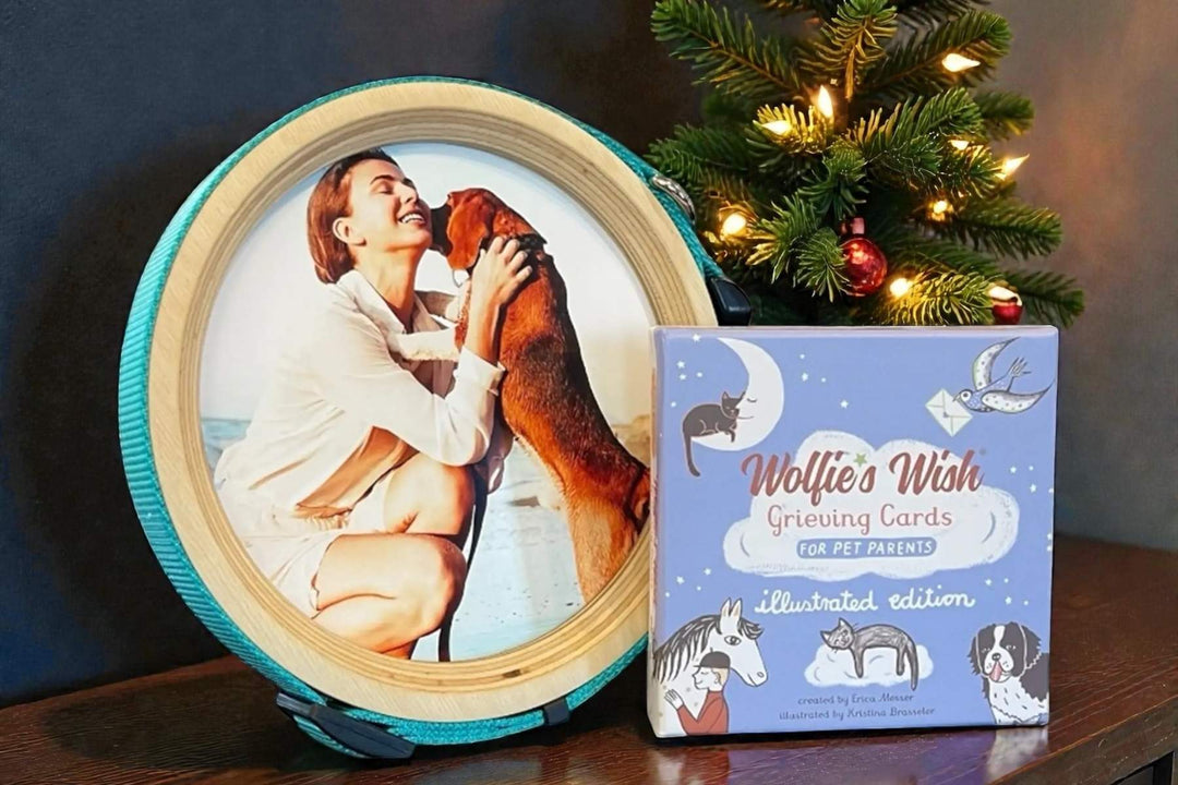 Pet memorial frame displayed with soft holiday decorations, honoring a beloved animal.